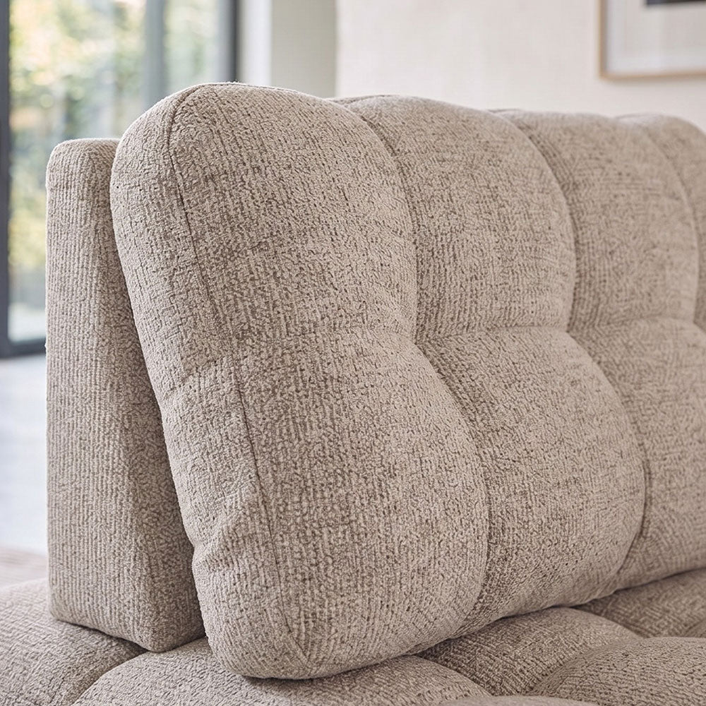Flow – poltrona imbottita in bouclé con seduta regolabile